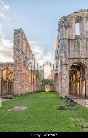 Evening Light on The Ruins of Fountains Abbey, Studley Royal Park, North Yorkshire, Ripon, England - A UNESCO World Heritage site