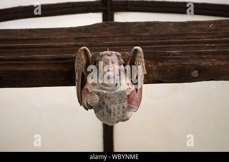 Angel medieval painted coloured wood carving Strensham Worcestershire Church of St John the Baptist UK HOMER SYKES Stock Photo