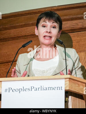 London, UK. 27th Aug, 2019. Caroline Lucas, The Green Party, speaks. Cross-party MPs and opposition party leaders assemble in the historic location of Church House in London to sign their 'Church House Declaration', with the intend to stop Parliament from being shut down by the government. Attendees include Lib Dem leader Jo Swinson, Labour Shadow Cabinet members John McDonnell and Sir Kier Starmer, the Green Party's Caroline Lucas, SNP's Ian Blackford and many others. Up to around 160 MPs are thought to have signed the declaration in total. Credit: Imageplotter/Alamy Live News Stock Photo