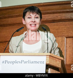 London, UK. 27th Aug, 2019. Caroline Lucas, The Green Party, speaks. Cross-party MPs and opposition party leaders assemble in the historic location of Church House in London to sign their 'Church House Declaration', with the intend to stop Parliament from being shut down by the government. Attendees include Lib Dem leader Jo Swinson, Labour Shadow Cabinet members John McDonnell and Sir Kier Starmer, the Green Party's Caroline Lucas, SNP's Ian Blackford and many others. Up to around 160 MPs are thought to have signed the declaration in total. Credit: Imageplotter/Alamy Live News Stock Photo