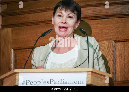 London, UK. 27th Aug, 2019. Caroline Lucas speaks. Cross-party MPs and opposition party leaders assemble in the historic location of Church House in London to sign their 'Church House Declaration', with the intend to stop Parliament from being shut down by the government. Attendees include Lib Dem leader Jo Swinson, Labour Shadow Cabinet members John McDonnell and Sir Kier Starmer, the Green Party's Caroline Lucas, SNP's Ian Blackford and many others. Up to around 160 MPs are thought to have signed the declaration in total. Credit: Imageplotter/Alamy Live News Stock Photo
