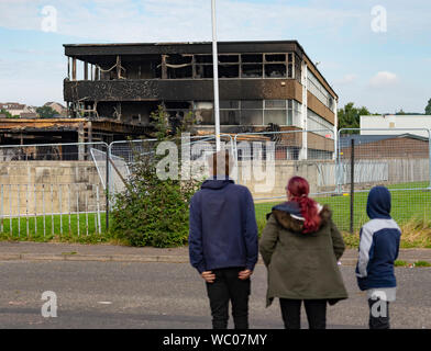 Dunfermline, Fife, Scotland, UK. 27 August 2019. Scottish Fire Service remain at Woodmill High School in Dunfermline following a large fire at the school on Sunday, Today it was announced that the school will remain closed in the short to medium term and Council leaders and teachers are currently discussing a range of options for the pupils. A 14-year-old male was arrested and charged yesterday (Monday) in connection with the incident, and appeared at Dunfermline Sheriff Court today. Iain Masterton/ Alamy Live News. Stock Photo