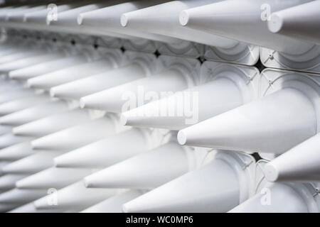 Perspective background of white cones installation. Stock Photo