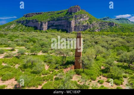 Aerial view of chimney or chacuaco of the sugar mill in El Gavilan Sonora. It is located around the country walk and ranch called El Gavilan, it is part of the Sonora River basin as it passes through the municipality of Hermosillo, Sonora Mexico. Sonora Desert. Sugar. old construction. Architect brick, landscape, rural, travel, (© Photo: LuisGutierrez / NortePhoto.com) Vista aerea de chimenea o chacuaco del ingenio azucarero en El Gavilan Sonora. Se encuentra en los alrededores del paseo campestre y rancho llamado el Gavilan, forma parte de la cuenca del Rio Sonora a su paso por el municipio d Stock Photo