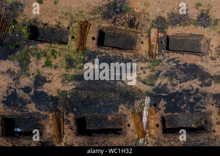 Aerial view of chimney or chacuaco of the sugar mill in El Gavilan Sonora. It is located around the country walk and ranch called El Gavilan, it is part of the Sonora River basin as it passes through the municipality of Hermosillo, Sonora Mexico. Sonora Desert. Sugar. old construction. Architect brick, landscape, rural, travel, (© Photo: LuisGutierrez / NortePhoto.com) Vista aerea de chimenea o chacuaco del ingenio azucarero en El Gavilan Sonora. Se encuentra en los alrededores del paseo campestre y rancho llamado el Gavilan, forma parte de la cuenca del Rio Sonora a su paso por el municipio d Stock Photo