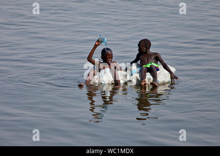 Boy Bathes River Floats On His Stock Photo 2122136057