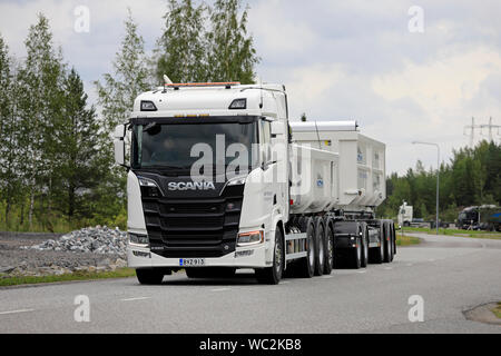 Turku, Finland. August 23, 2019. White Next Generation Scania R650 truck pulls gravel trailer on road test. Scania in Finland 70 years tour. Stock Photo