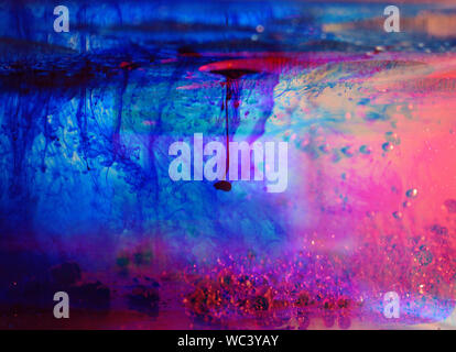 Walk into a magical world of ink and water with this photo. Many different patterns and shapes created, something new to look at everyday. Stock Photo
