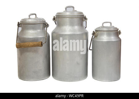 three retro aluminium milk cans on white background Stock Photo