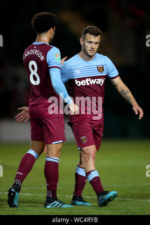 West Ham United's Jack Wilshere (right) leaves the field after being substituted during the Carabao Cup Second Round match at Rodney Parade, Newport. Stock Photo
