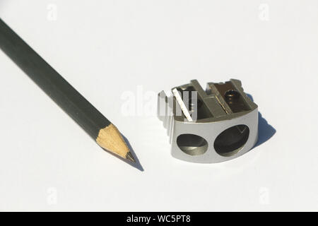 Pencil and sharpener on white background Stock Photo