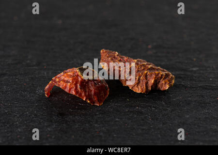 Group of two pieces of lavender strawberry ice tea on grey stone Stock Photo