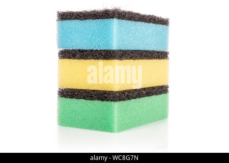 Group of three whole cleaning kitchen sponge one on top of another isolated on white background Stock Photo