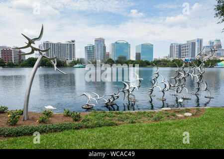 Orlando, PF - June 17, 2018: 'Take Flight' a sculpture by Douwe Blumberg is located along the shore of Lake Eola in downtown. Stock Photo