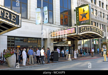 People gather outside the Playhouse Square State Theatre prior to