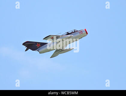 'Red 18' from the Norwegian Air Force Historical Squadron is a Soviet designed Mig-15 fighter. It was the first swept winged jet fighter in the world. Stock Photo