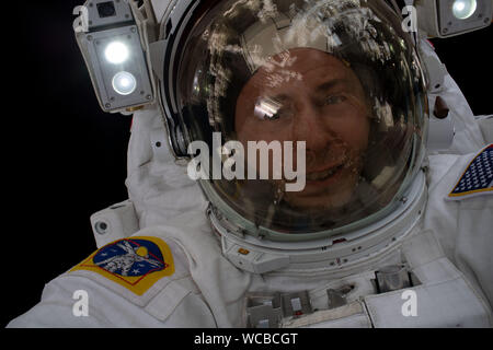 Andrew R. Morgan NASA astronaut Andrew Morgan takes a selfie during a spacewalk to ...