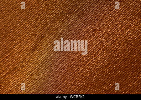Old gold or copper canvas textured background closeup Stock Photo
