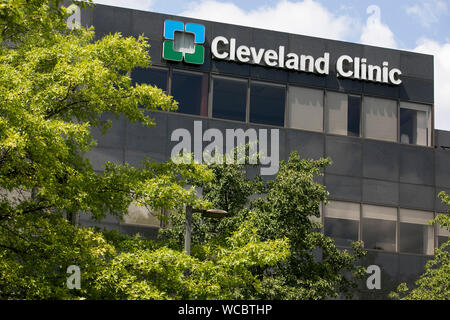 A logo sign outside of a facility occupied by the Cleveland Clinic in Beachwood, Ohio on August 11, 2019. Stock Photo