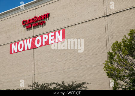A logo sign outside of a CubeSmart self-storage facility recently opened in a former big box retail store location in Richmond Heights, Ohio on August Stock Photo
