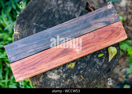 Black white wood and Burmese rosewood log exotic background, wooden surface with beautiful Stock Photo