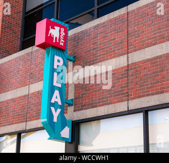 Zynga sign with bulldog logo and play sign on the facade of social video game services company - San Francisco, California, USA - July 12, 2019 Stock Photo