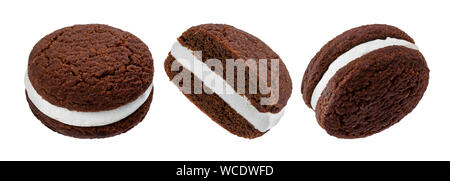 Chocolate sandwich cookies, baked biscuits stuffed with milk cream isolated on white background Stock Photo