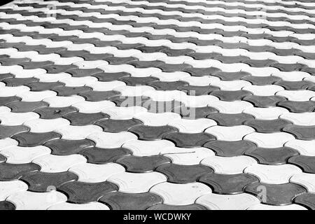 View of footpath tiles in monochrome. Stock Photo