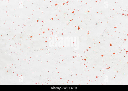 Close-up of a white fiberglass (fibreglass) surface with red dots. High resolution full frame abstract background. Copy space. Stock Photo