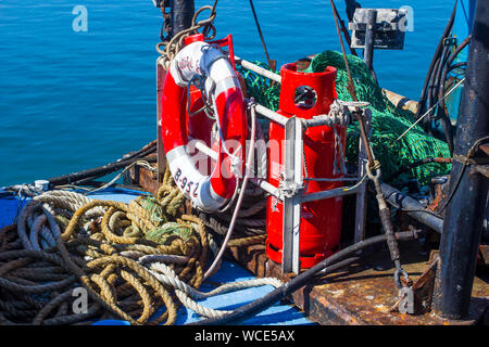 8 August 2019 The clutter stowed on the deck of a working trawler in berthed in Ardglass harbour County Down Northern Ireland Stock Photo