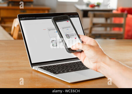 Scanning of a photoTAN with smartphone during online banking, GERMANY. Stock Photo