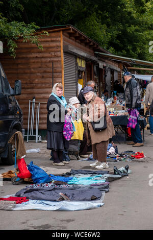 MOSCOW, RUSSIA - AUGUST 3, 2019: The wooden stalls of Izmailovsky market with the wide range of souvenirs, art and craft goods, antiques and others. A Stock Photo