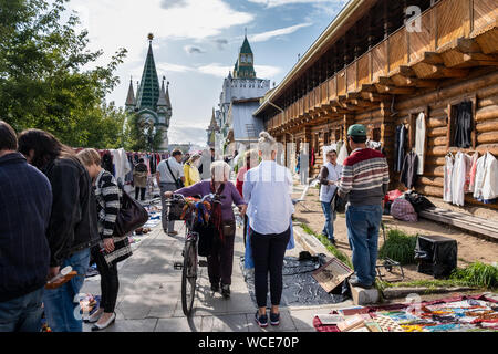 MOSCOW, RUSSIA - AUGUST 3, 2019: The wooden stalls of Izmailovsky market with the wide range of souvenirs, art and craft goods, antiques and others. l Stock Photo