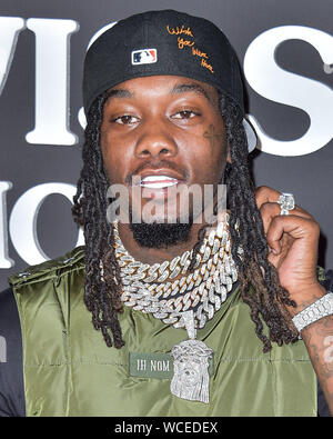 Santa Monica, United States. 27th Aug, 2019. SANTA MONICA, LOS ANGELES, CALIFORNIA, USA - AUGUST 27: Rapper Offset arrives at the Los Angeles Premiere Of Netflix's 'Travis Scott: Look Mom I Can Fly' held at Barker Hangar on August 27, 2019 in Santa Monica, Los Angeles, California, United States. ( Credit: Image Press Agency/Alamy Live News Stock Photo