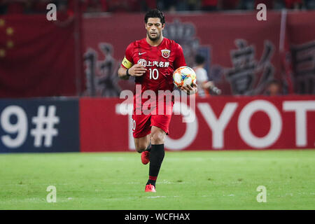 Brazilian football player Givanildo Vieira de Sousa, known as Hulk, of Shanghai SIPG F.C., holds the ball at the quarter final match against Urawa Red Diamonds during 2019 Asian Champions League in Shanghai, China, 27 August 2019. Stock Photo