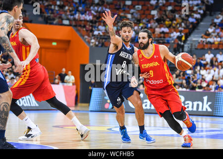 Ricky Rubio, right, of Spain men's national basketball team challenges Nicolas Laprovittola of Argentina national basketball team during the 2019 International Men's Basketball Tournament in Ningbo city, east China's Zhejiang province, 27 August 2019. Spain defeated Argentina 84:76. Stock Photo