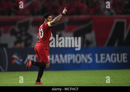Brazilian football player Givanildo Vieira de Sousa, known as Hulk, of Shanghai SIPG F.C., celebrates after score at the quarter final match against Urawa Red Diamonds during 2019 Asian Champions League in Shanghai, China, 27 August 2019. Stock Photo