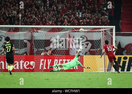 Brazilian football player Givanildo Vieira de Sousa, known as Hulk, of Shanghai SIPG F.C., right, scores at the quarter final match against Urawa Red Diamonds during 2019 Asian Champions League in Shanghai, China, 27 August 2019. Stock Photo