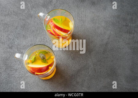 Top view of apple tea into two glass cups Stock Photo