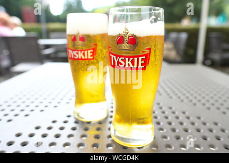 Polish beer Tyskie lager brand at cafe in Poland Stock Photo