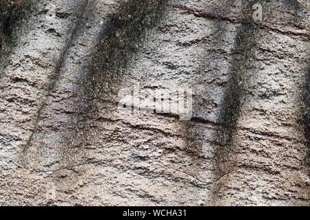 Detailed textures of concrete and granite walls in a vintage weathered look Stock Photo