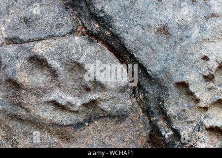 Detailed textures of concrete and granite walls in a vintage weathered look Stock Photo