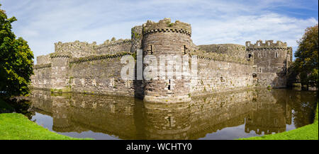 The ruins of Beaumaris Castle built in the 14th century by Edward the first as part of his military fortifications to conquer Wales Stock Photo