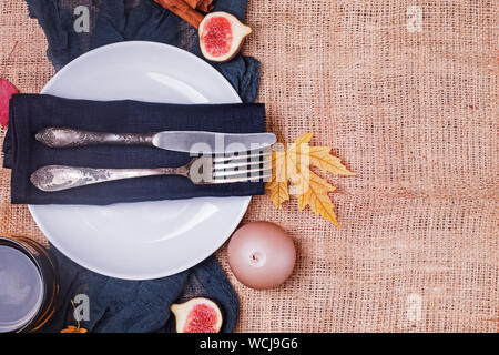 Table decorated for Thanksgiving dinner. Autumn table setting, top view Stock Photo