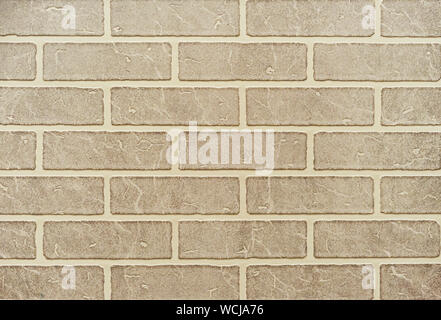Texture of a light brown brick wall for background. Stock Photo