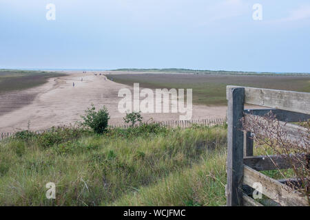 sandy path leading down to beach at Holkham, Norfolk, UK on summers da Stock Photo