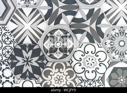 Gray ceramic tiles with ornaments. Background and texture of ceramic tiles. Stock Photo