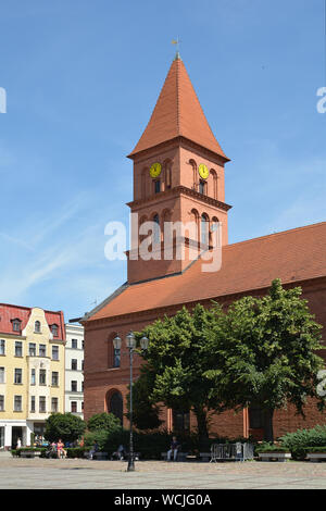 Church of Holy Trinity of 1824 on the New market square Rynek Nowomiejski in Torun - Poland. Stock Photo