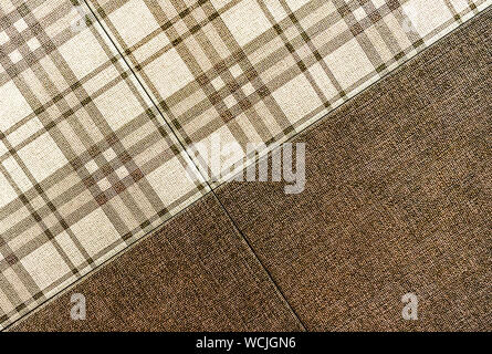 Brown ceramic tile with a cage. Background of ceramic tiles. Stock Photo