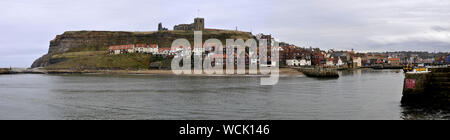 A panoramic view of Whitby, North Yorkshire, showing the Abbey & harbour entrance Stock Photo